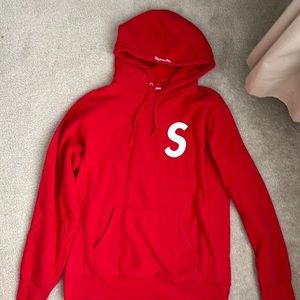 Supreme Hoodie in red with white quilted “S” size large.